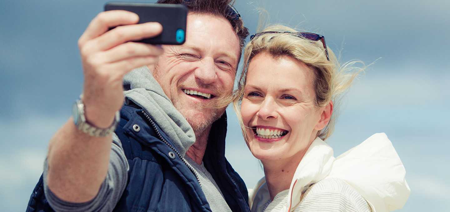 A couple taking a selfie